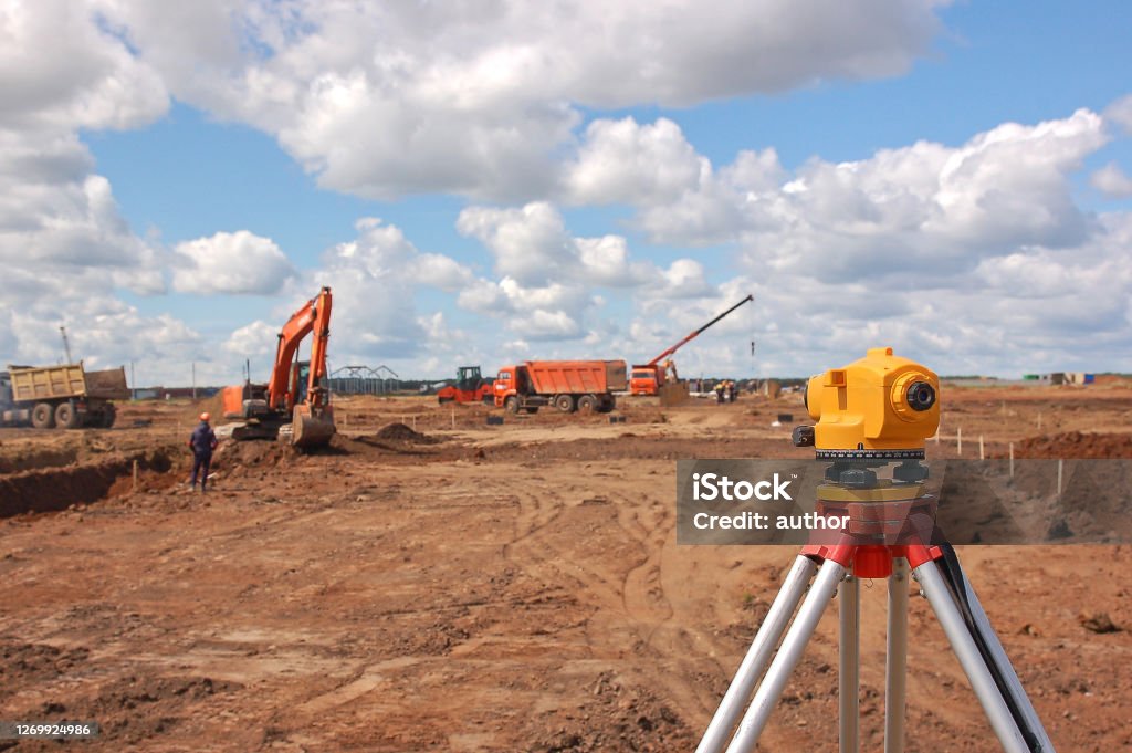 Surveying measuring equipment level theodolite on tripod. Construction measuring tool